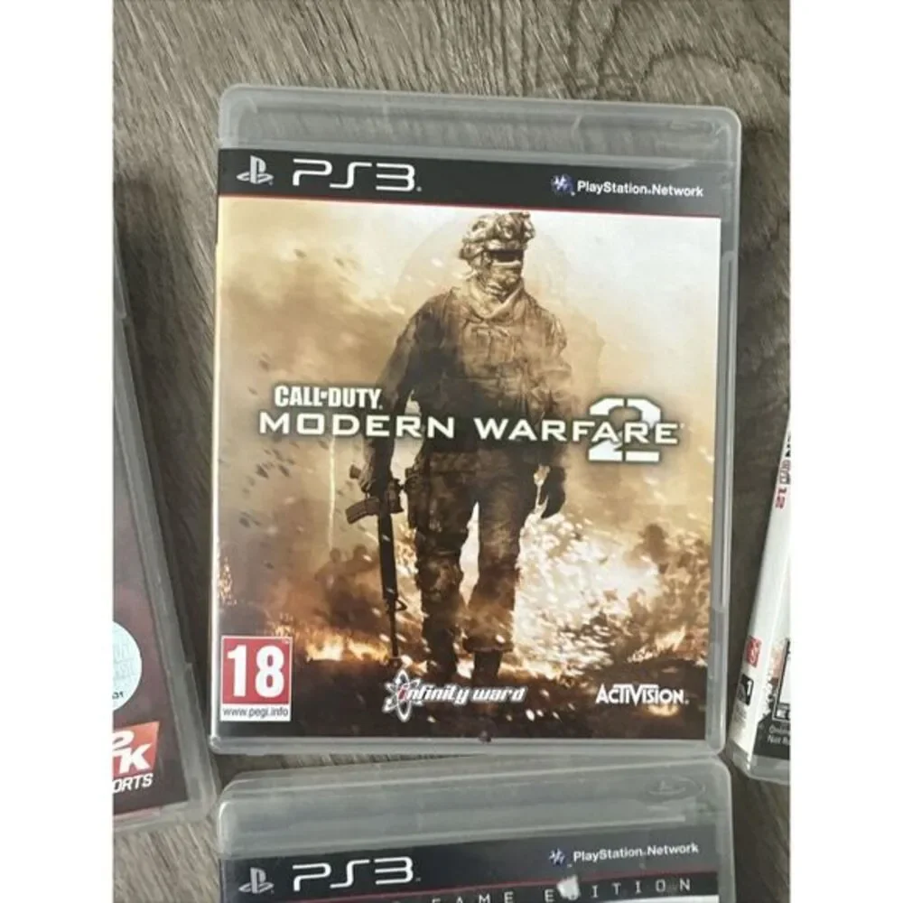 PS3 games Lot of 4 NBA2k, Madden 12, Madden 12 HOF edition, COD Modern Warfare 2